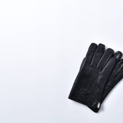 Black men's gloves isolated on a white background