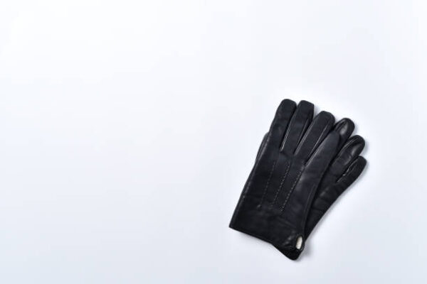 Black men's gloves isolated on a white background