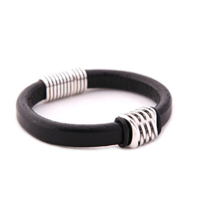 Leather bracelet on white background