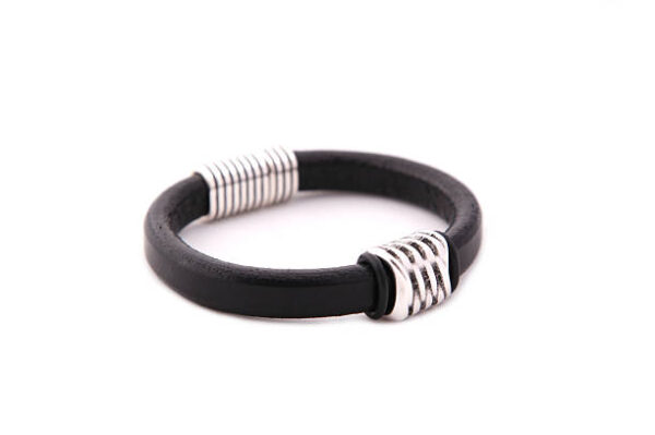 Leather bracelet on white background